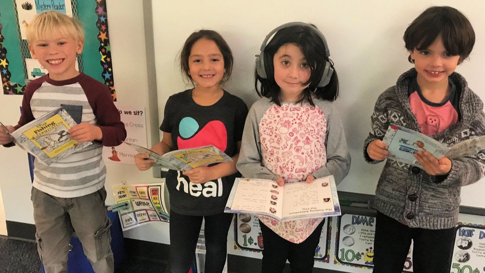 1st & 4th Grade Students performing in Reader's Theater