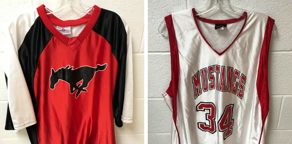 Two old Mustang high school athletic jerseys
