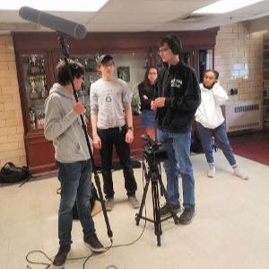 GMHS film crew discusses a video shoot